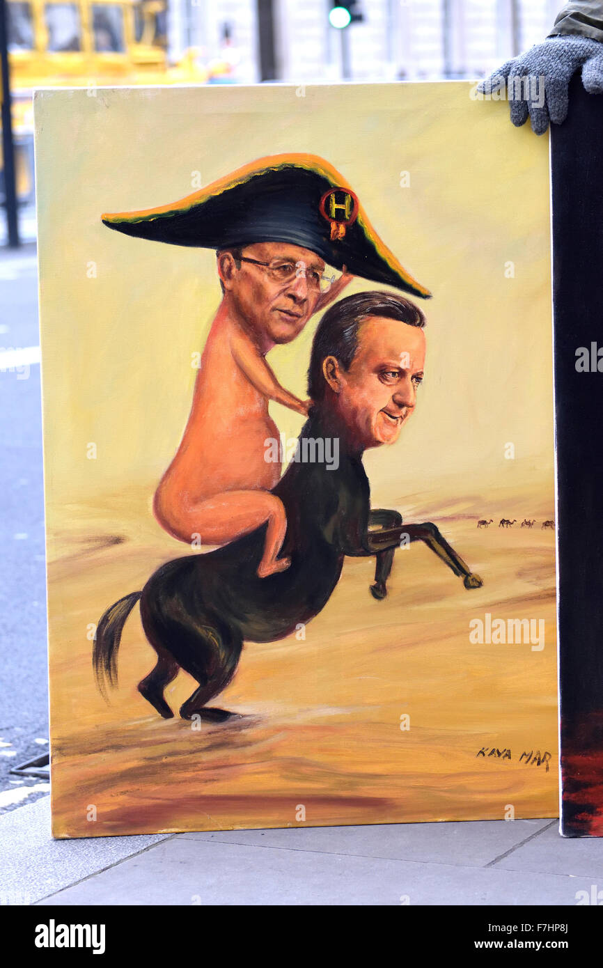 Kaya Mar - caricaturiste avec son travail "aharan Quicksand' (2011), François Hollande et David Cameron Banque D'Images