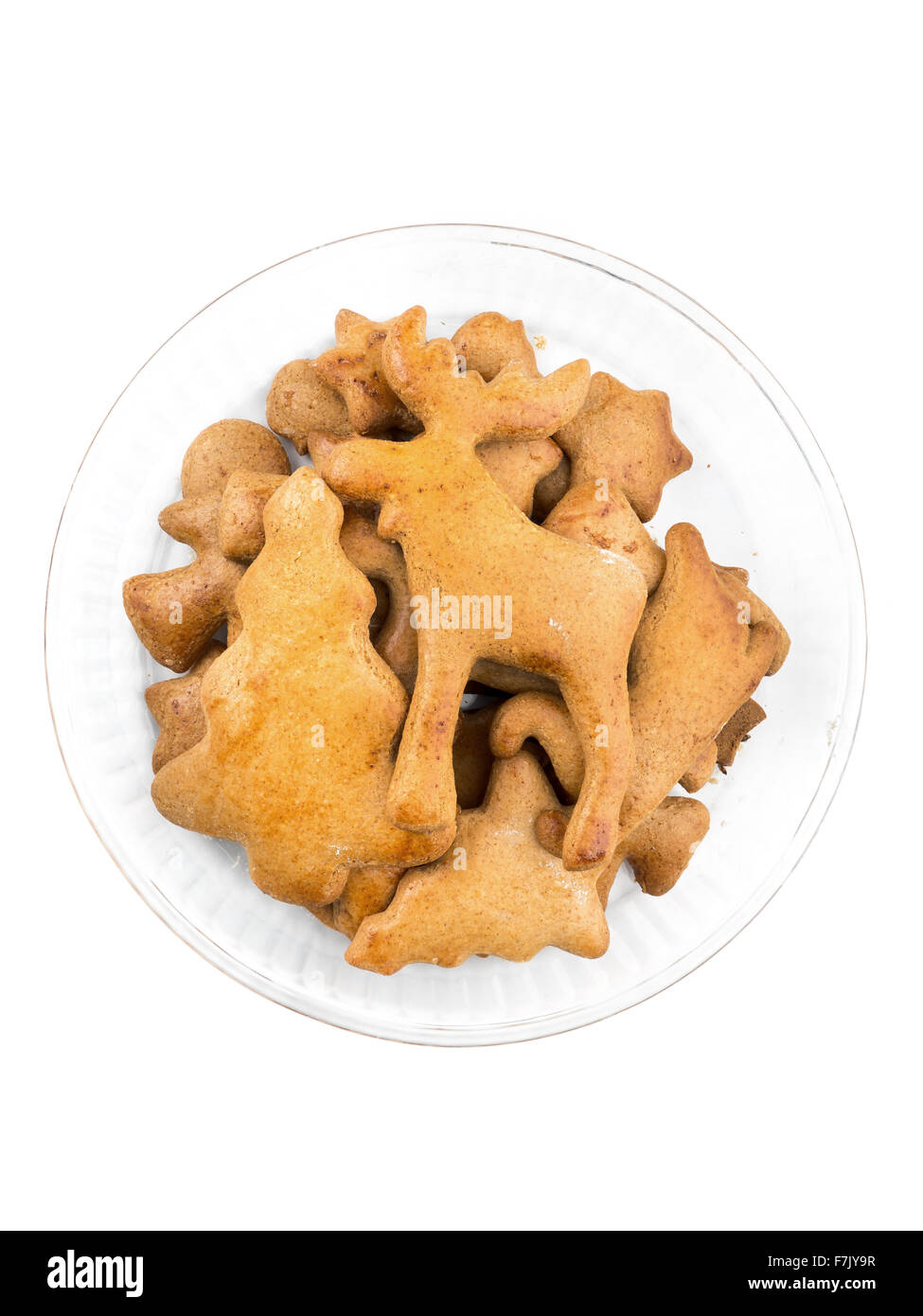 Christmas gingerbread cookies dans bol en verre sur fond blanc Banque D'Images