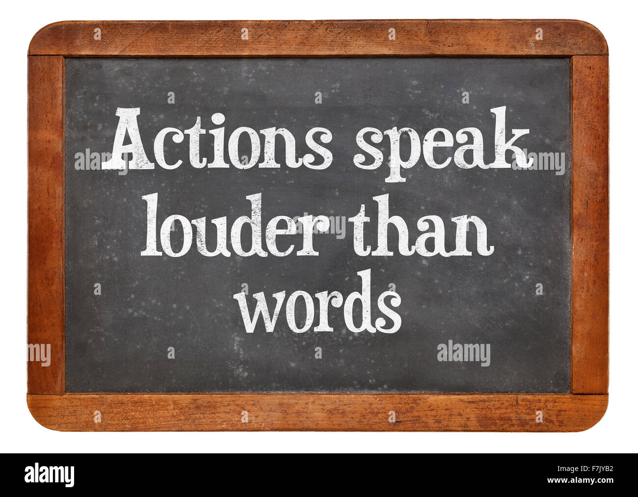 Les actes sont plus éloquents que les mots de motivation - proverbe une phrase sur un tableau noir ardoise vintage Banque D'Images