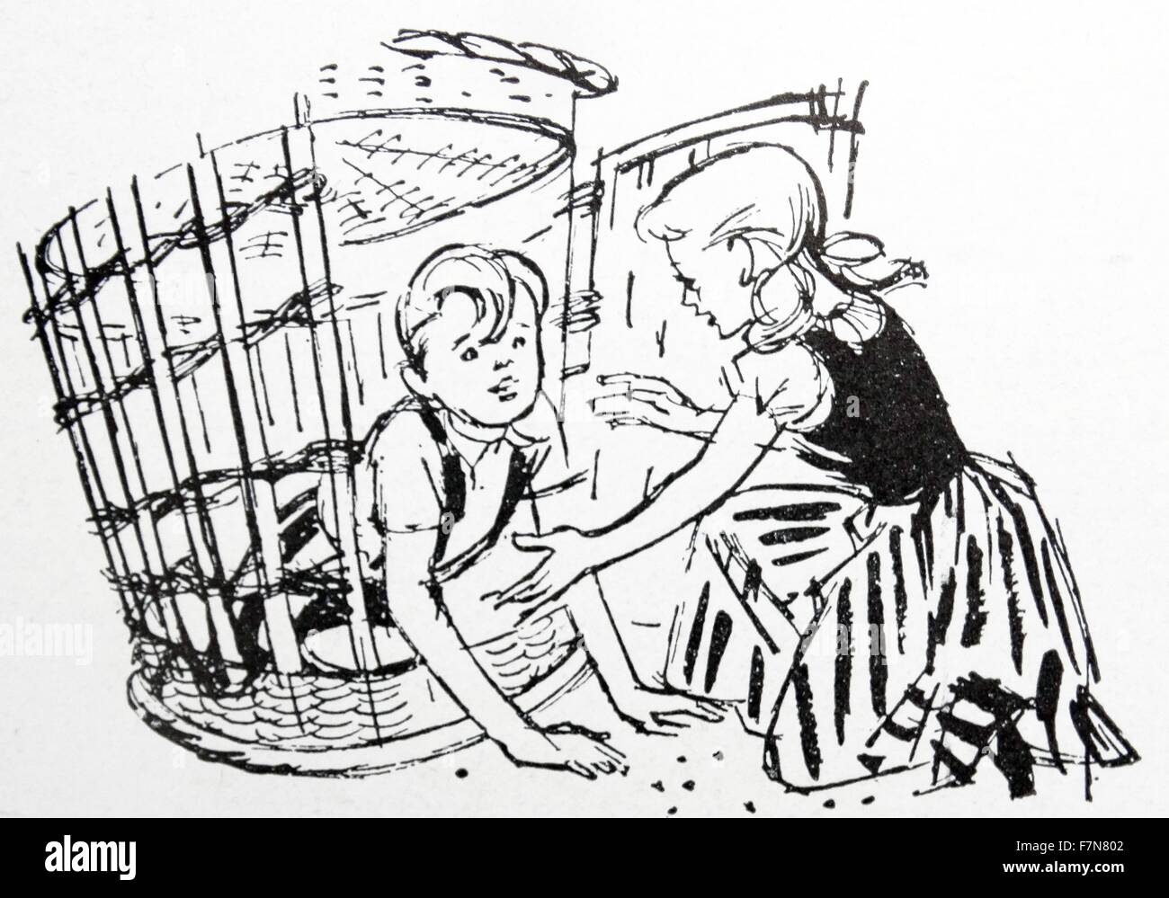Hansel et Gretel conte d'origine allemande, par les frères Grimm publié en 1812. Hansel et Gretel sont un jeune frère et sœur menacée par une sorcière anthropophage vivant profondément dans la forêt dans une maison construite de gâteau et de la confiserie Banque D'Images