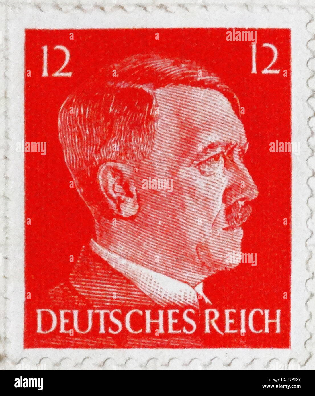 Adolf Hitler Chancelier de l'Allemagne nazie représenté sur un timbre-poste 1936 Banque D'Images