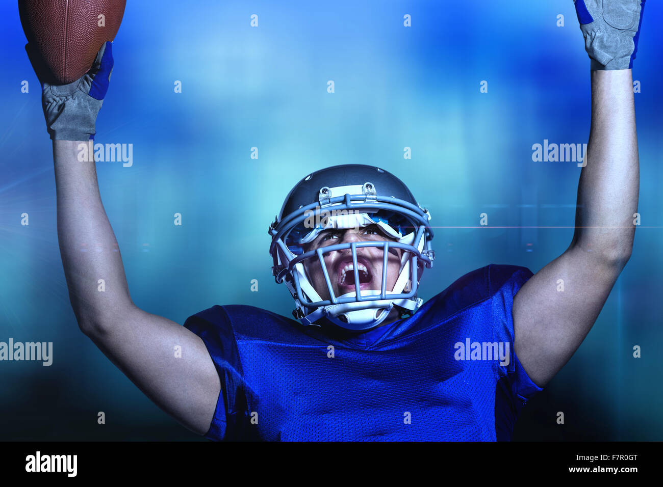 Image composite de joueur de football américain en uniforme cheering Banque D'Images