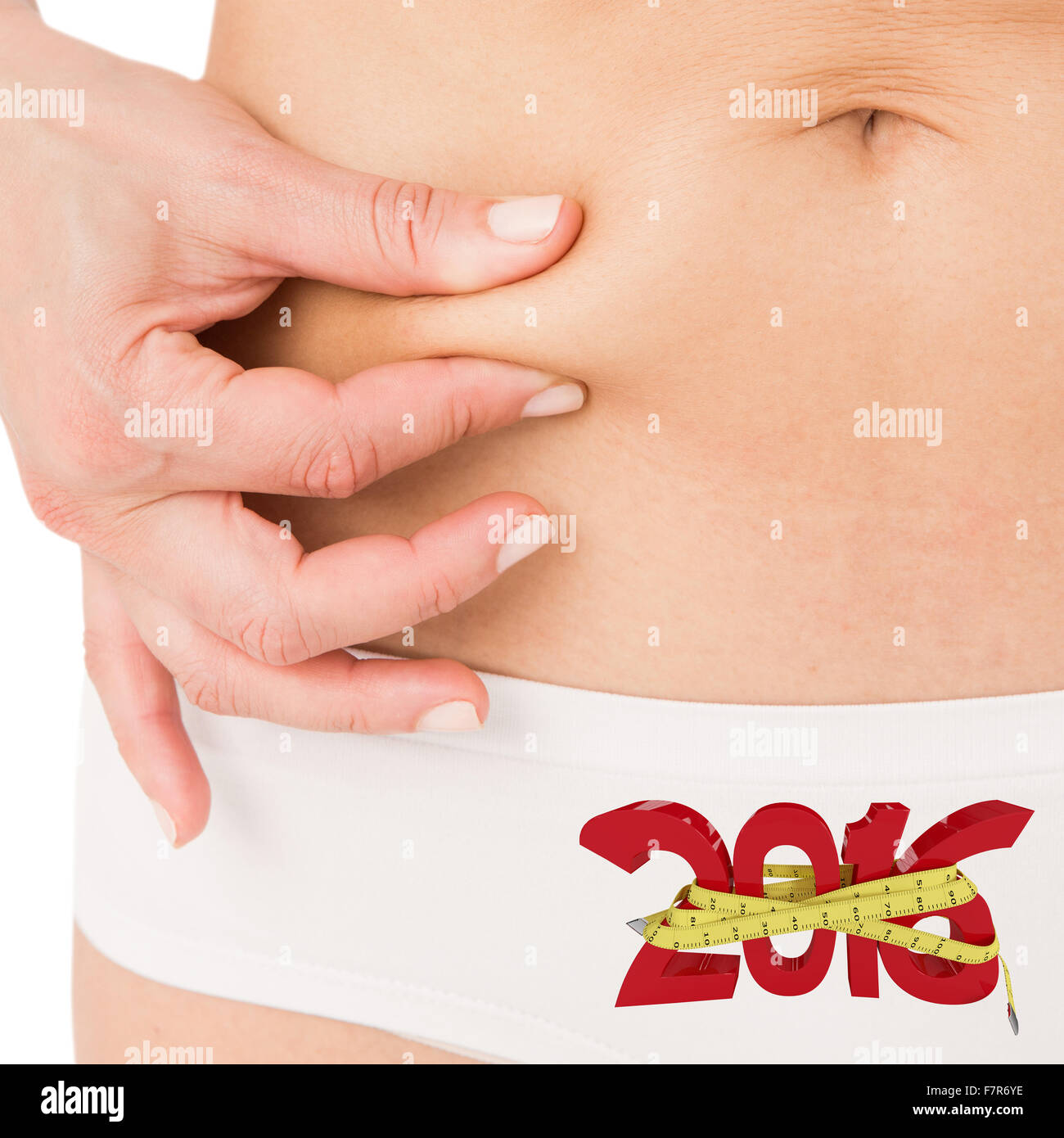 Image composite de fit woman pincer son estomac Banque D'Images