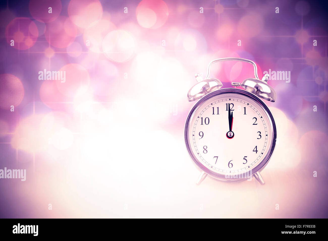 Image composite de minuit heure d'une horloge Banque D'Images