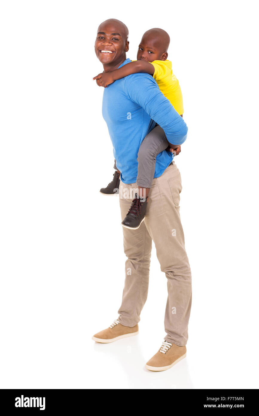 Les Africains piggyback ride on white background Banque D'Images