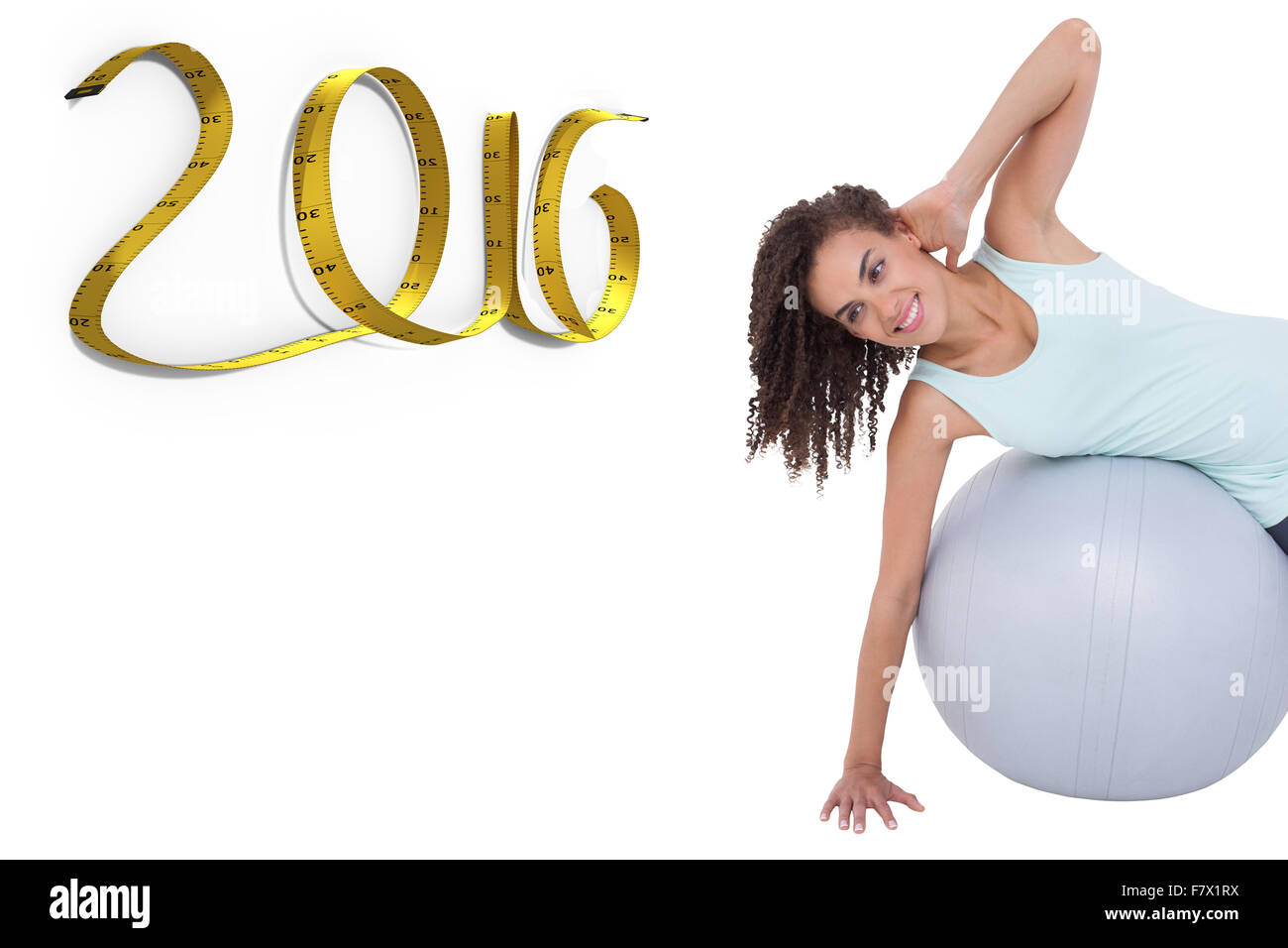 Image composite de fit woman on exercise ball Banque D'Images