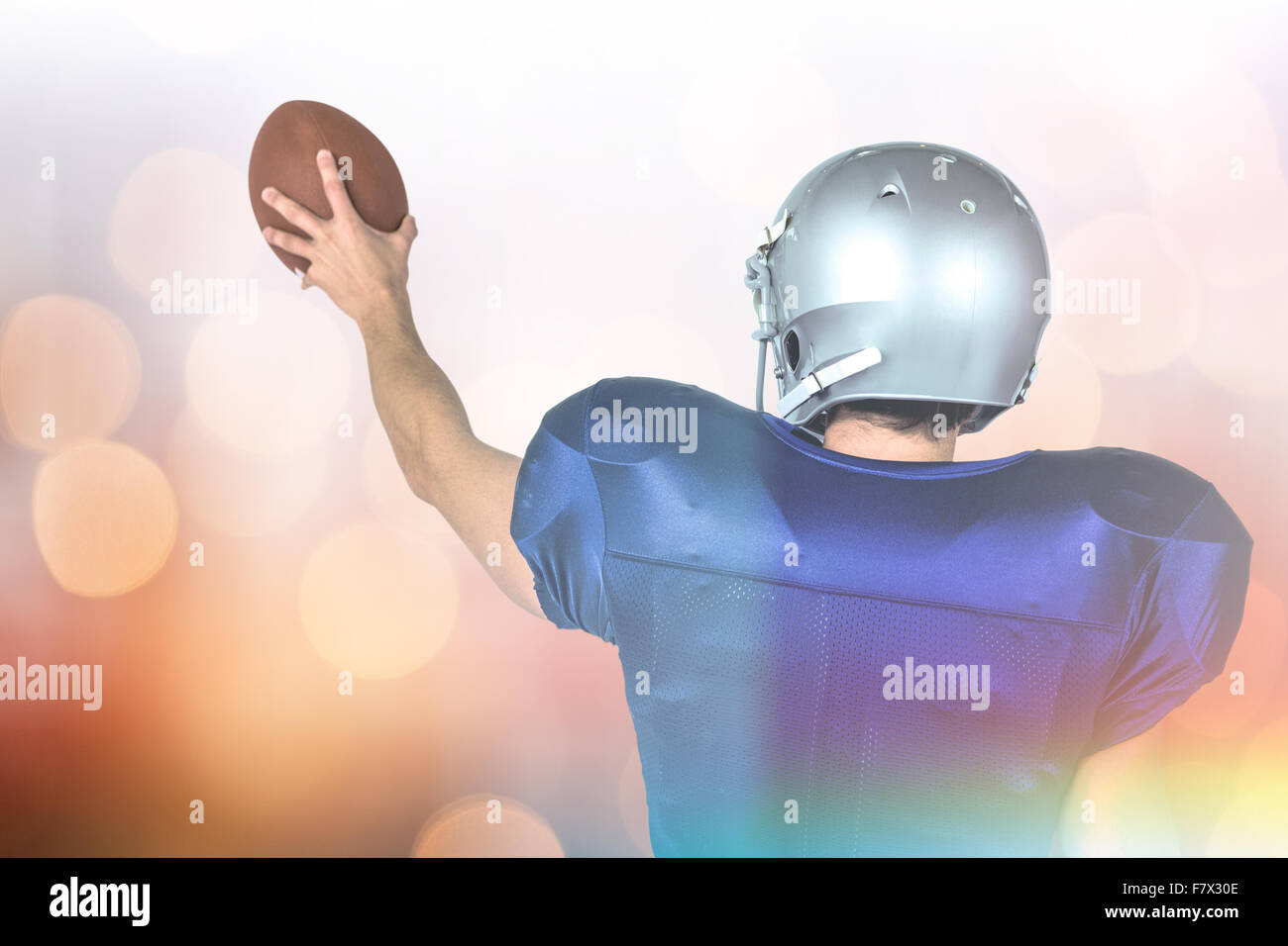 Image composite de sports player holding ball Banque D'Images