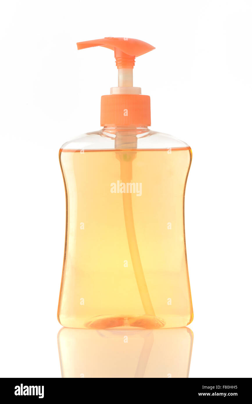 Lavage des mains savon liquide dans la couleur orange Banque D'Images