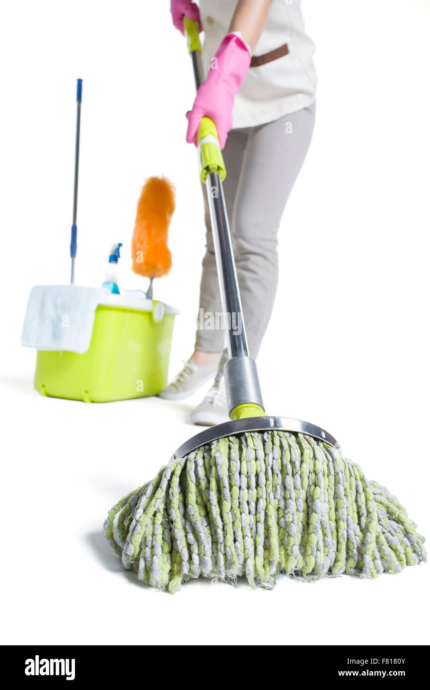 Cleaner holding a mop Banque D'Images