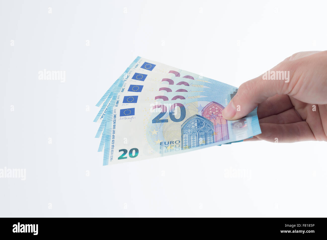 Vingt euros révisé Note dans la main tenue - conception révisée Banque D'Images