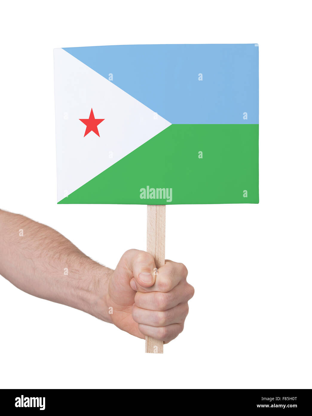 Main tenant petite carte, isolé sur blanc - Pavillon de Djibouti Banque D'Images