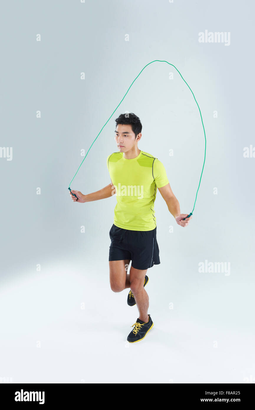 Man jumping rope Banque D'Images