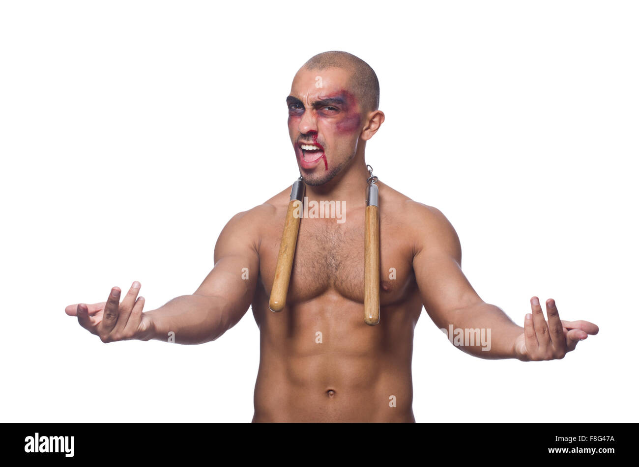 Homme avec nunchucks isolated on white Banque D'Images
