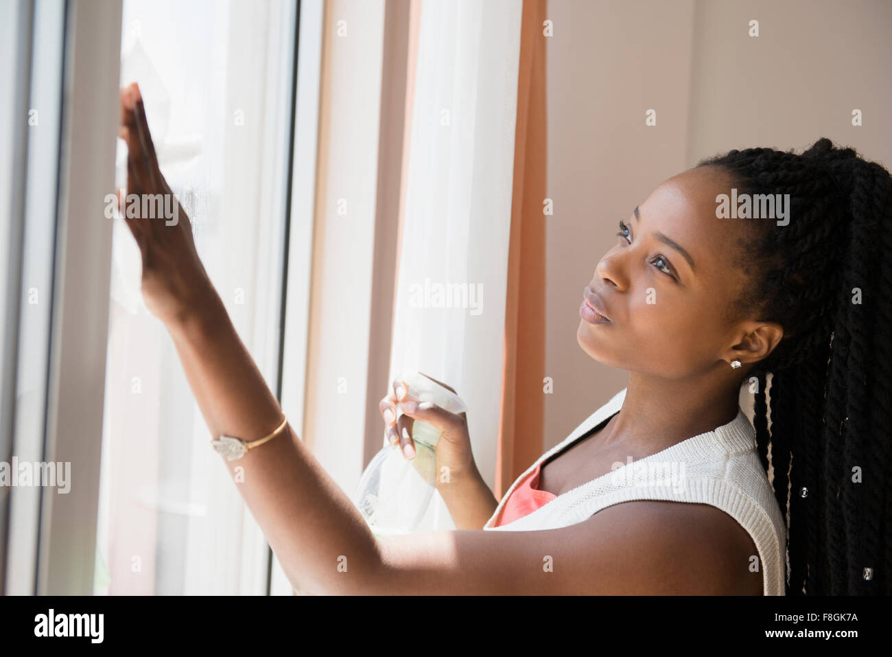 Femme noire lave-vitre Banque D'Images