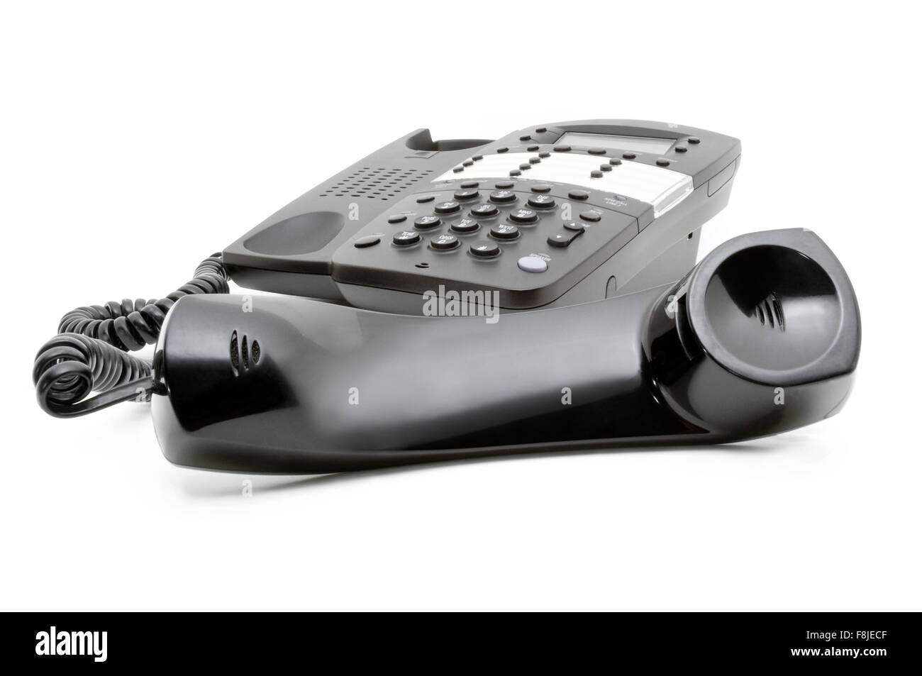 Black business phone avec le récepteur off the hook cut out isolé sur un fond blanc avec personne Banque D'Images