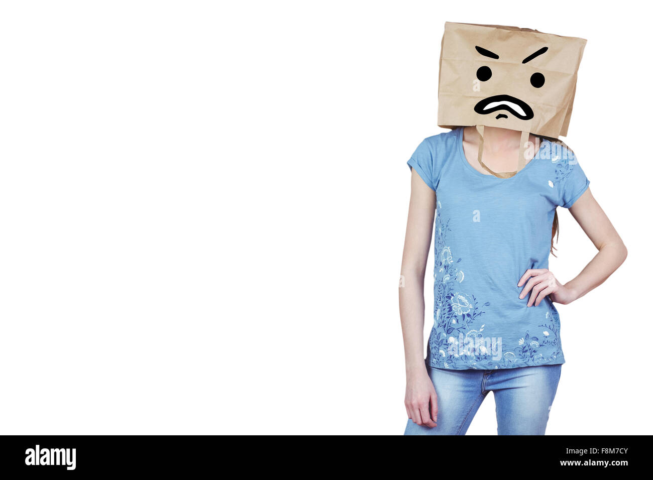 Image composite de Dame posant avec un sac sur la tête Banque D'Images