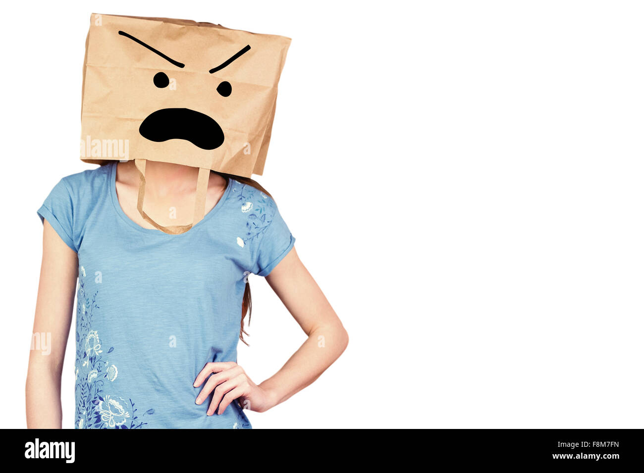 Image composite de Dame posant avec un sac sur la tête Banque D'Images