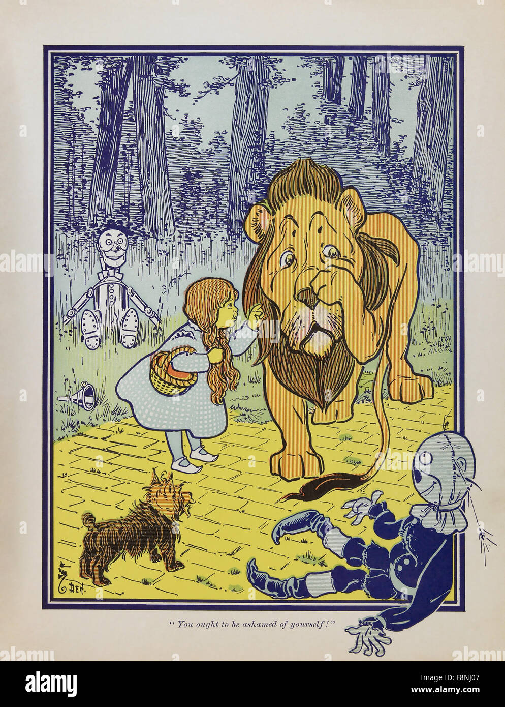 Le Wonderful Wizard of Oz, Dorothy rencontre le lion lâche appelée pour la première édition en 1900 du livre de Frank Baum par William Denslow. Banque D'Images