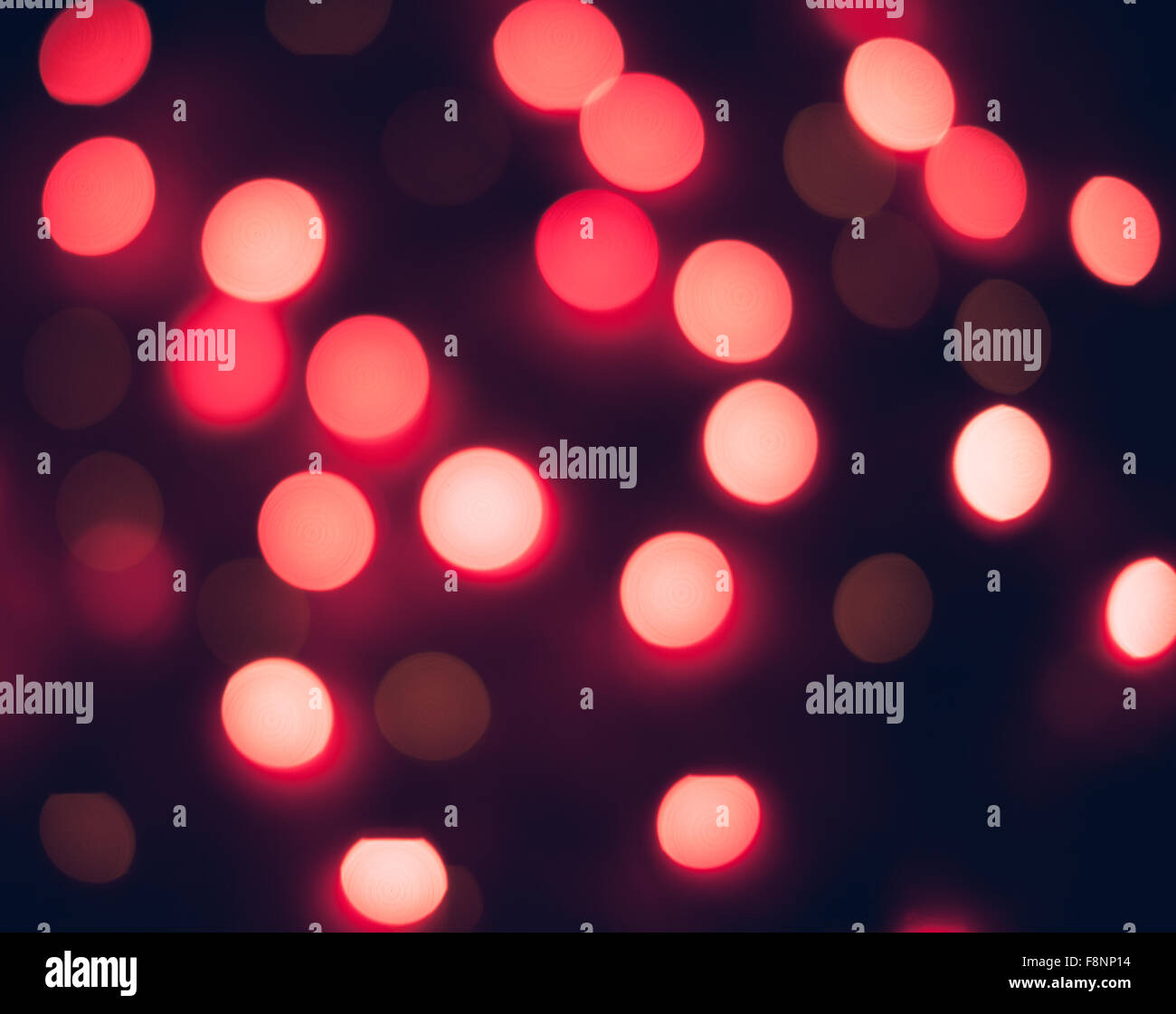 Les lumières de Noël de flou artistique. Bokeh Nouvel An. Résumé fond pour la conception de vacances Banque D'Images