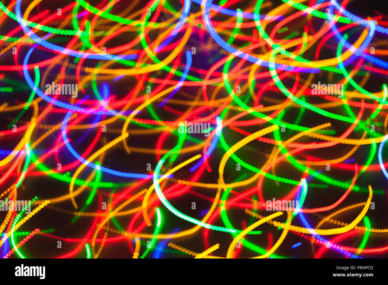 Les lumières de Noël de flou artistique. Bokeh Nouvel An. Résumé fond pour la conception de vacances Banque D'Images