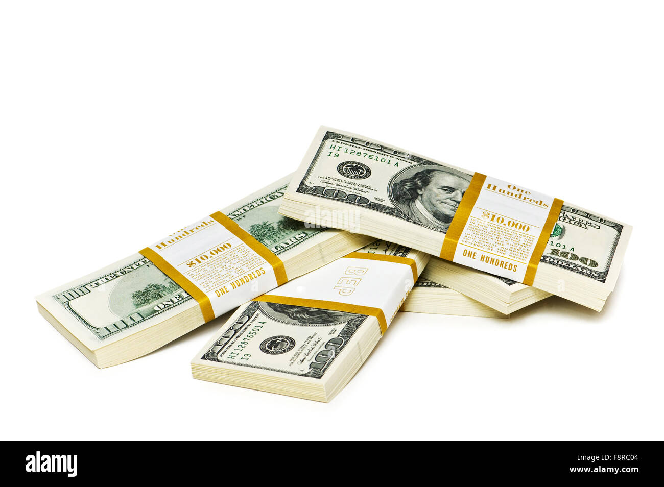 Dix mille dollars stacks sur le livre blanc Banque D'Images Dix mille dollars stacks sur le livre blanc Banque D'Images