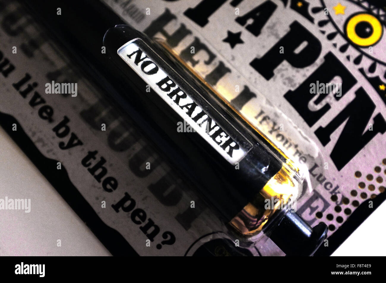 Un message sur une prédiction pen photographié sur un fond blanc. Banque D'Images