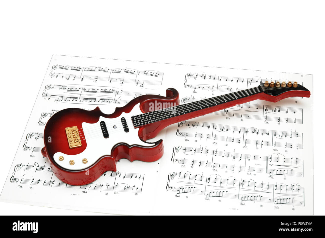 La guitare Rock sur la feuille de musique imprimée Banque D'Images