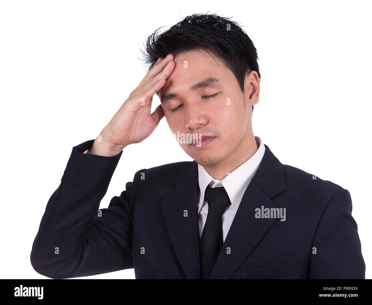 L'homme d'affaires ayant le stress ou un mal de tête isolé sur fond blanc Banque D'Images
