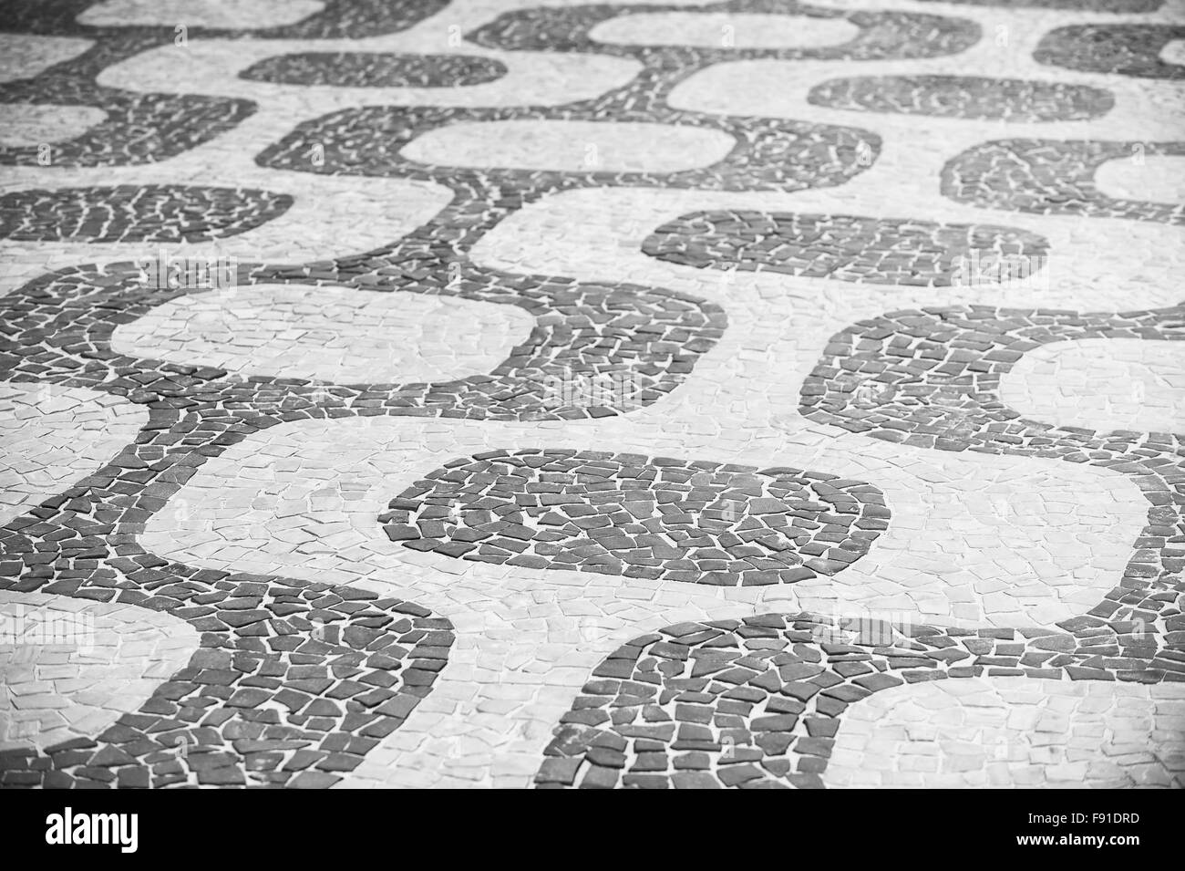 La plage d'Ipanema Rio de Janeiro Brésil trottoir plein frame background close-up Banque D'Images