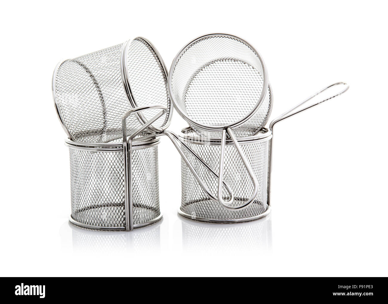 Acier inoxydable vide quatre paniers de puce sur un fond blanc Banque D'Images
