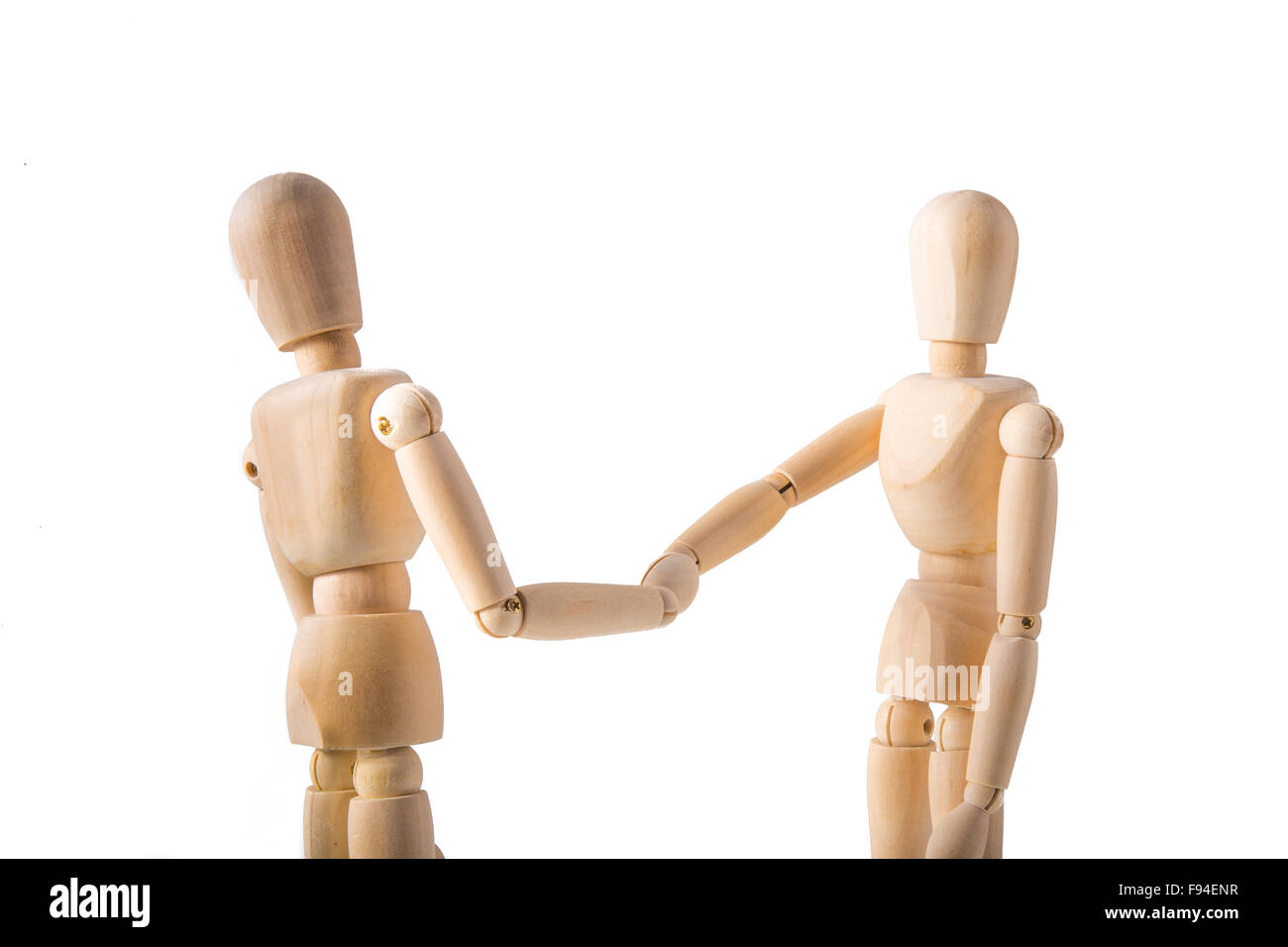 Deux marionnettes shaking hands on white background Banque D'Images