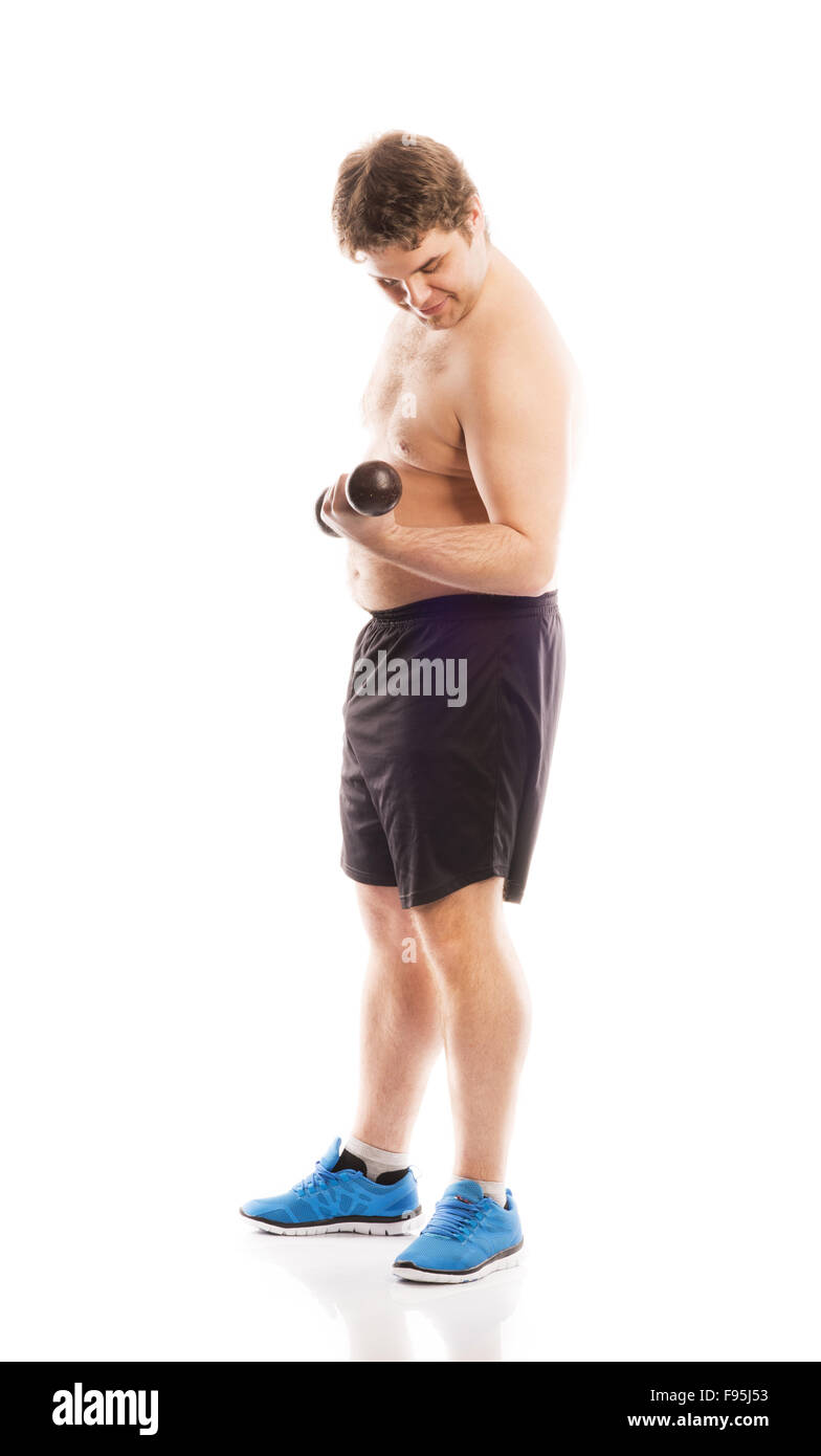 Fat Man fitness pose en studio sur fond blanc. Banque D'Images