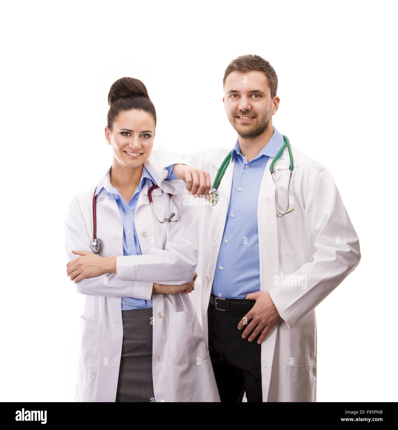 L'équipe médicale de médecins heureux, l'homme et la femme, isolé sur fond blanc Banque D'Images