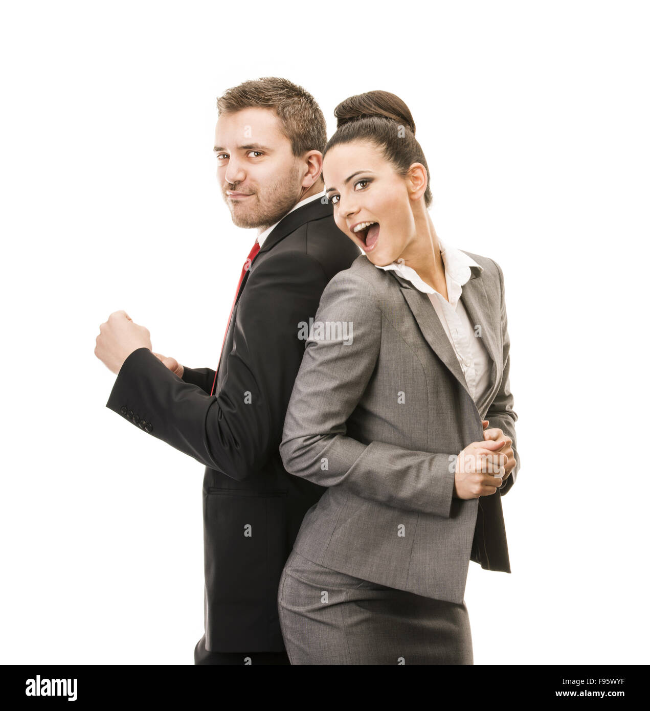 Young smiling business woman et homme d'affaires isolated over white background. Folle et drôle posing in studio. Banque D'Images