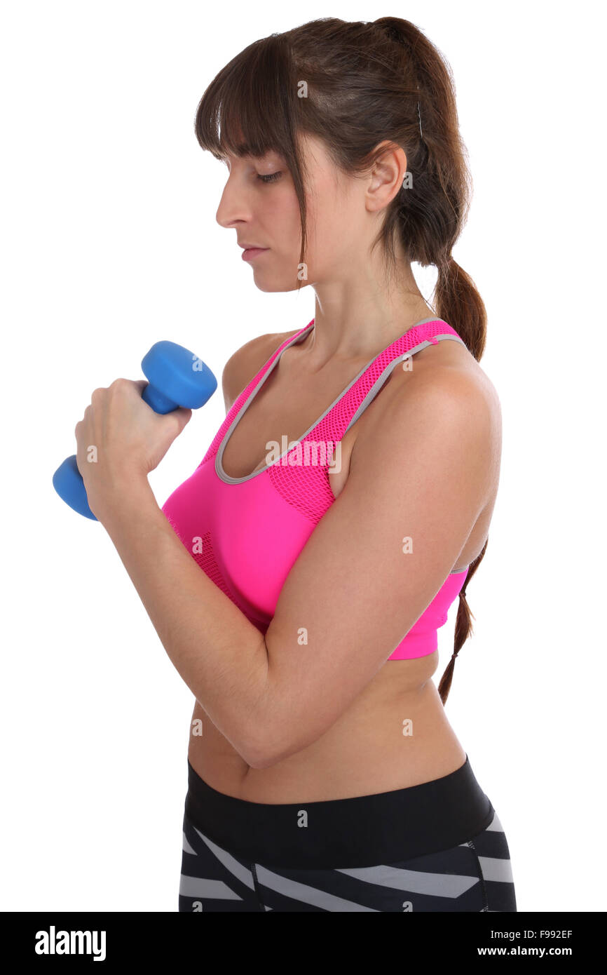 La concentration d'entraînement fitness femme focus à l'entraînement sportif avec haltère isolé sur fond blanc Banque D'Images