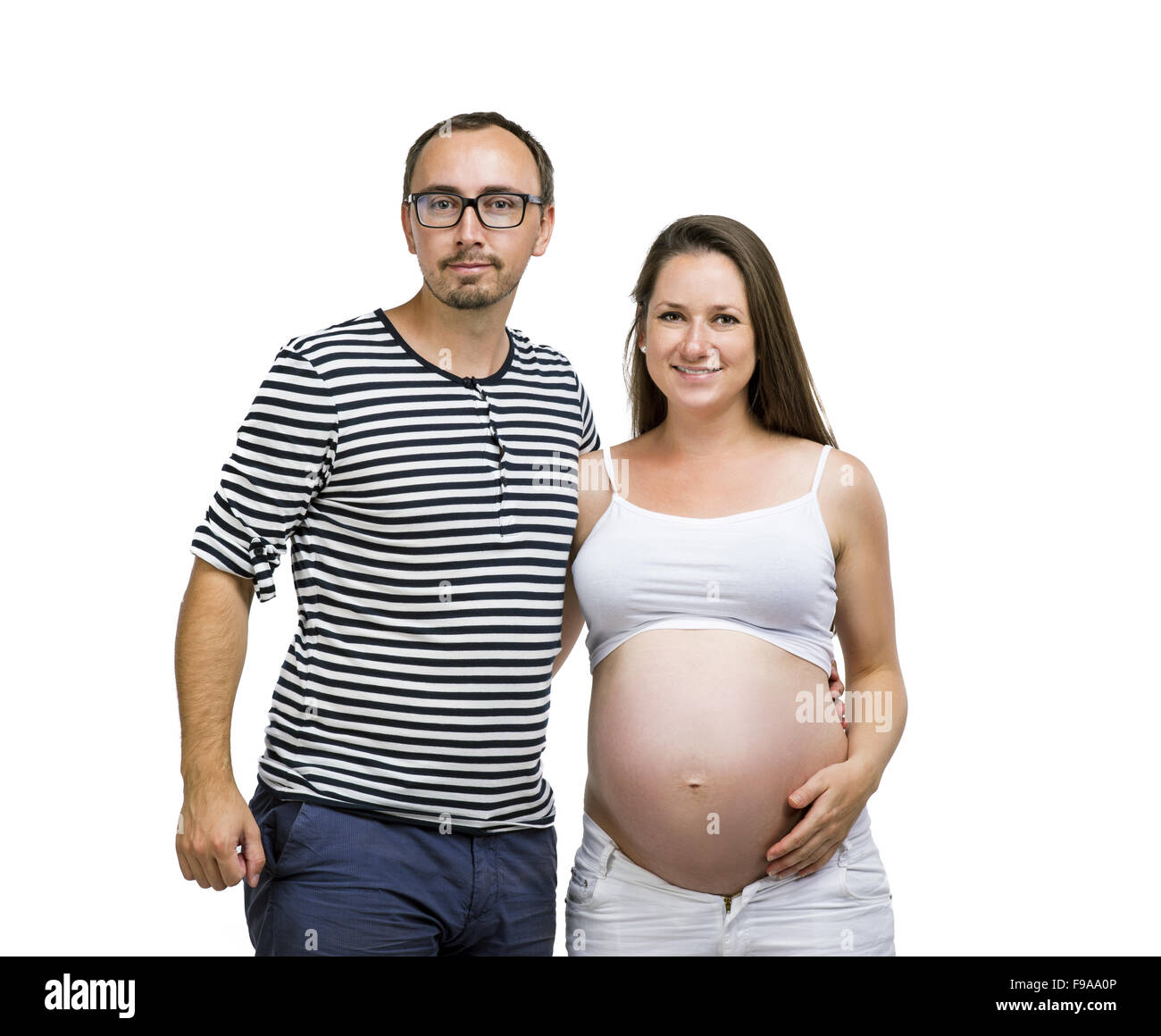 Portrait of young pregnant woman posing in studio, isolé sur fond blanc Banque D'Images