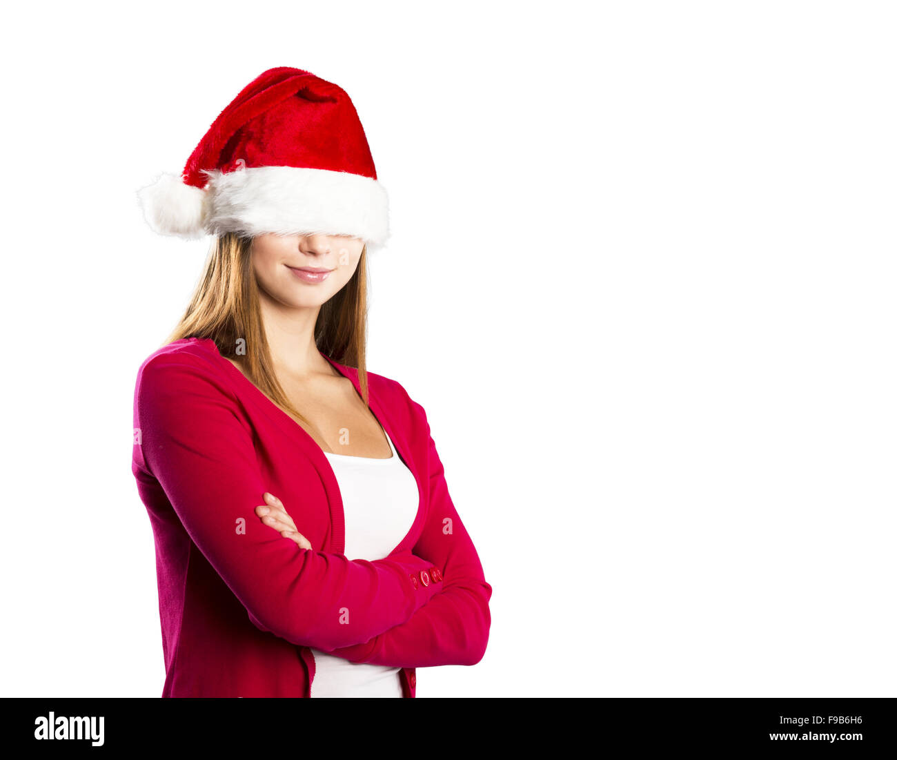 Portrait of attractive woman isolated on white background, studio shot in christmas hat Banque D'Images