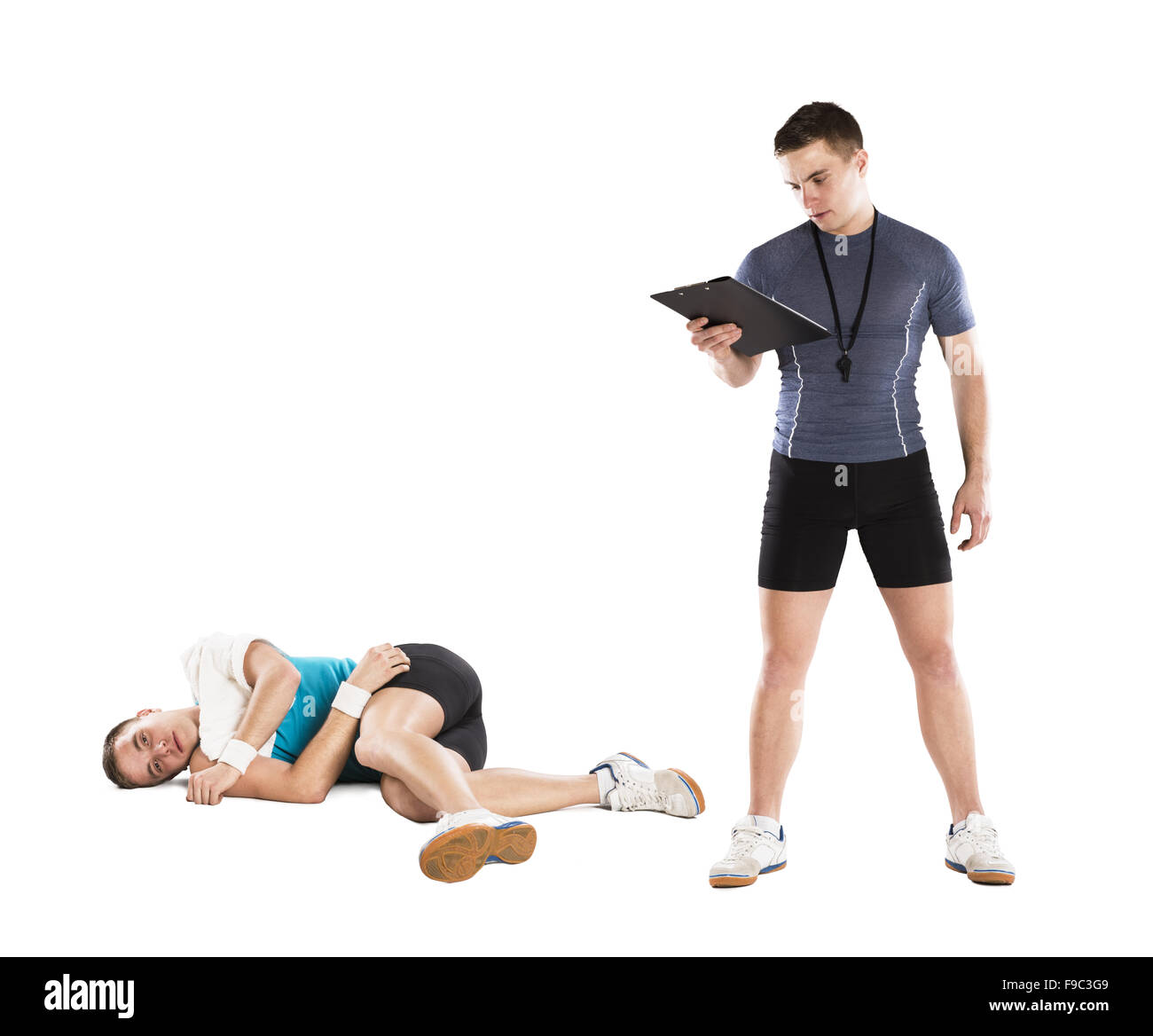 Coach de fitness professionnel La formation est lui-même, isolé sur fond whithe. Banque D'Images
