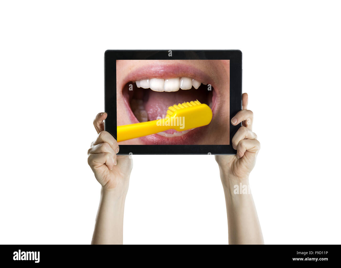 Gros plan dentaire avec écran de tablette, isolated on white Banque D'Images