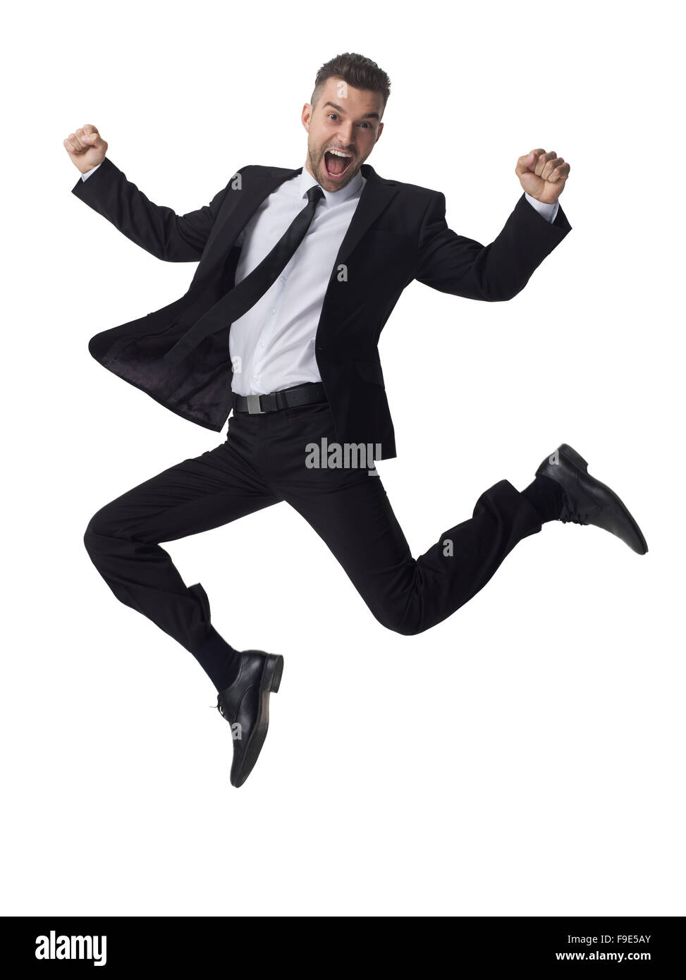 Businessman jumping portrait isolé sur fond blanc Banque D'Images