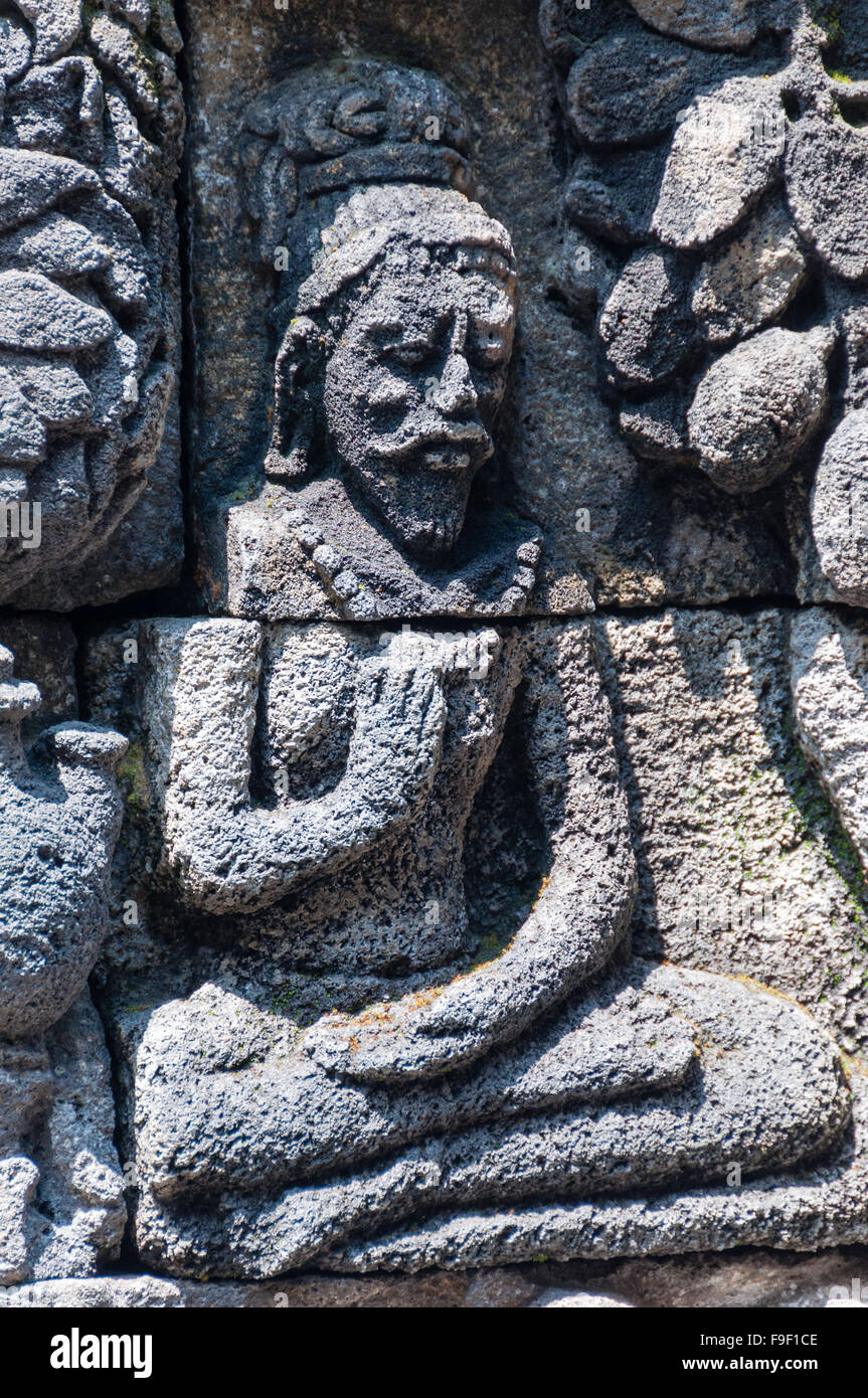 Méditer et coin de la sculpture sur pierre à Borobudur Banque D'Images