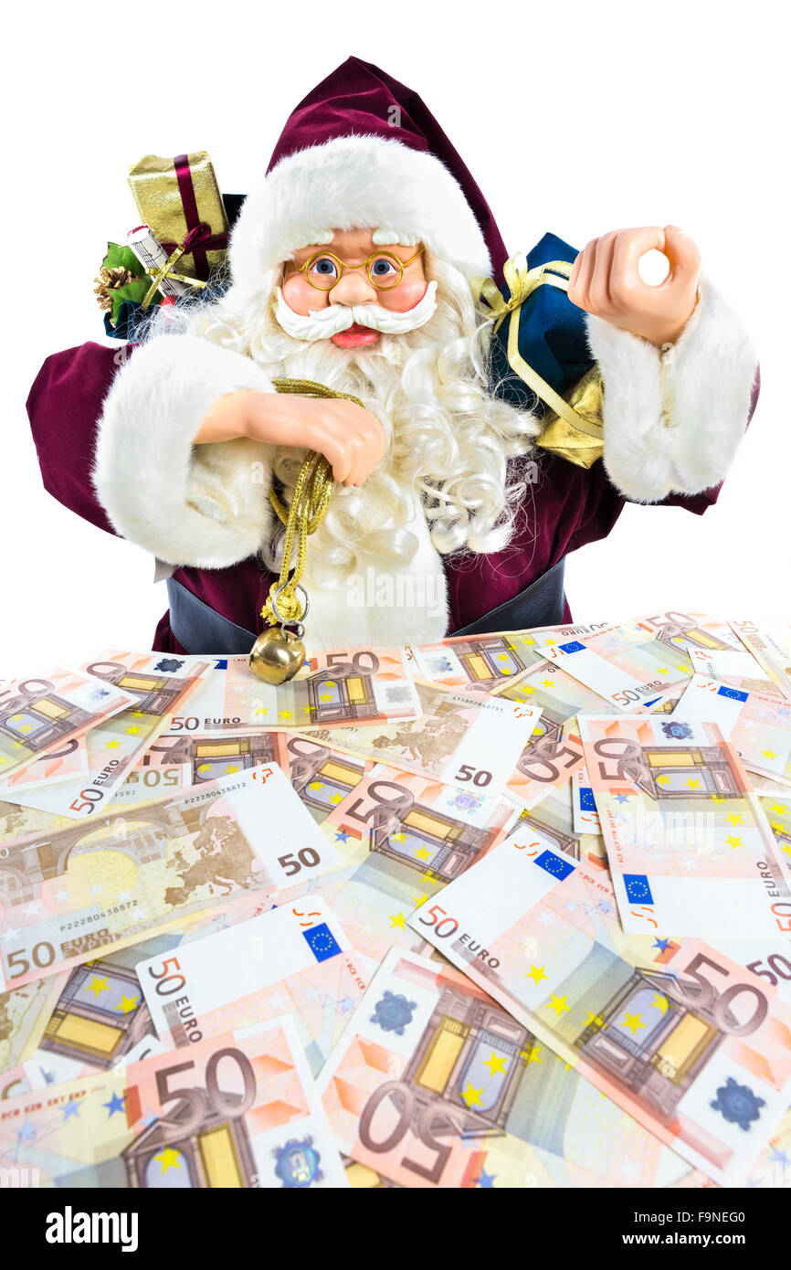 Modèle de Père Noël avec des cadeaux et des billets d'euros isolé sur fond blanc Banque D'Images