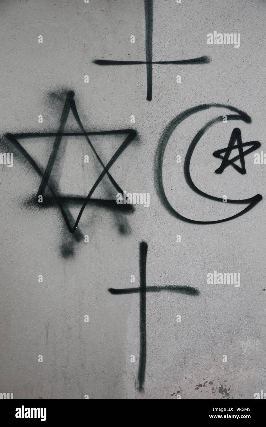 Symboles religieux marquées sur un mur. Banque D'Images