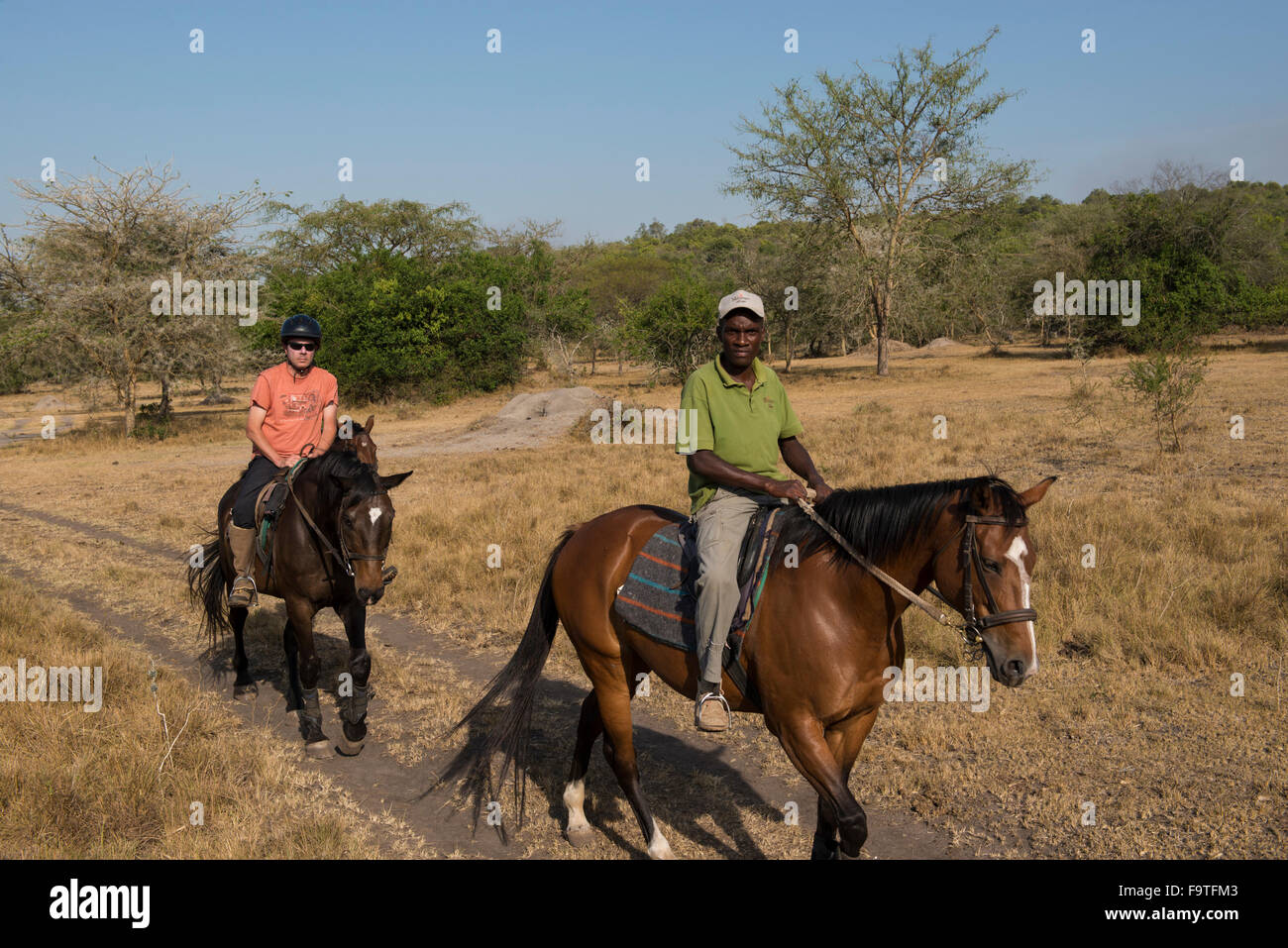 Safari a cheval, le parc national du lac Mburo, Ouganda Banque D'Images