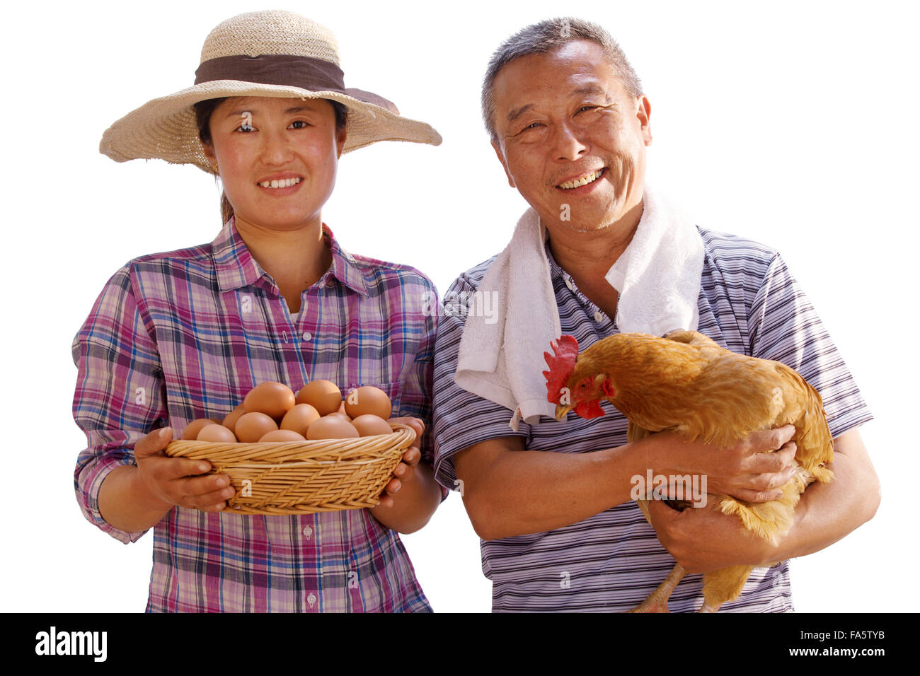 L'agriculteur a pris l'oeuf et la poule Banque D'Images