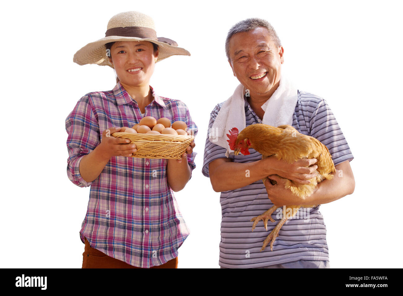 L'agriculteur a pris l'oeuf et la poule Banque D'Images