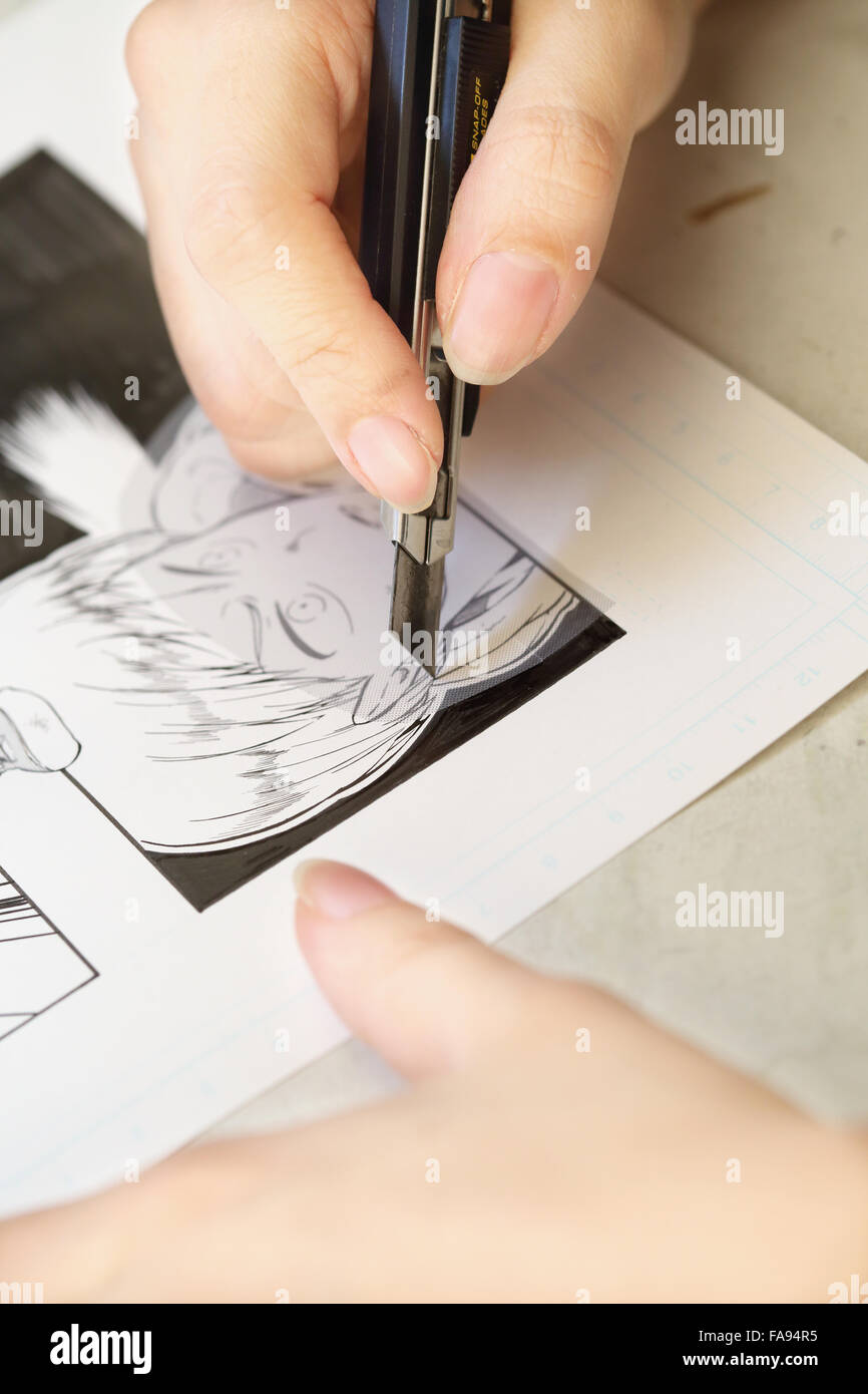 Artiste manga japonais travaillant dans le studio Banque D'Images