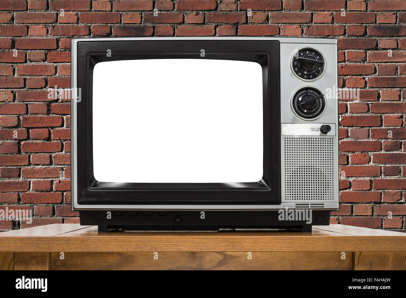 La télévision analogique avec mur de brique et découper l'écran. Banque D'Images