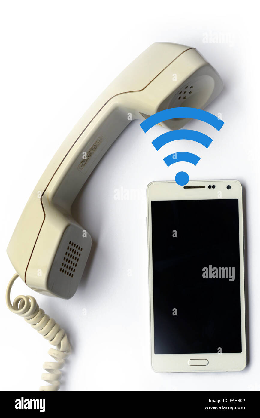Le transfert de données sans fil de téléphone mobile à ligne terrestre combiné Banque D'Images