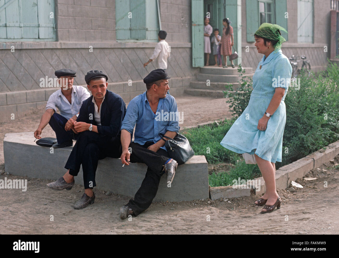 Hommes et femmes en ouïghour Turpan, Province du Xinjiang, Chine Banque D'Images